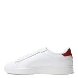 Championes urbanos Puma modelo Smash 3.0 L, color negro con detalles en blanco. Presentan el logo de la marca en el lateral y la lengüeta, con cierre de cordones y suela de goma blanca.