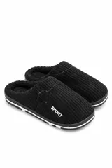 Pantuflas de pana color gris, con diseño texturizado, interior de corderito sintético y suela de goma con detalles en blanco.