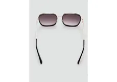 Lentes de sol con montura cuadrada combinada de policarbonato negro y detalles de cobre, con cristales degradados.