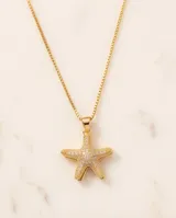 Collar de bronce con cadena fina y doble dije colgante en forma de estrella de mar, uno de ellos pavimentado con circonias y el otro con una perla central.