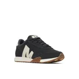 Zapatillas Merrell Sprint Anthem Ltr de estilo retro inspirado en el running de los años 70, confeccionadas en ante y malla negra con la clásica 'M' lateral en color blanco. Cuentan con entresuela de EVA y suela de goma con relieve.