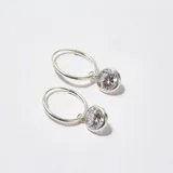 Aros de plata 925 tipo argolla con dije colgante de piedra de cristal engarzada.