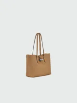 Bolso tote Longchamp modelo Roseau Essential, color tostado, confeccionado en cuero flexible con cierre tipo toggle y doble asa de hombro.