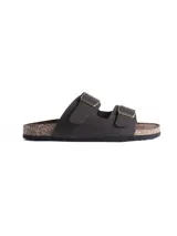 Sandalia tipo Birkenstock color negro, con doble tira ajustable mediante hebillas metálicas doradas y base de corcho con suela de goma.