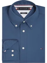 Camisa Tommy Hilfiger azul de popelina de algodón con Flex Technology, cuello abotonado, corte regular, mangas largas y logo bordado en el pecho.