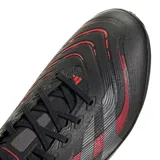 Championes de fútbol Adidas Predator League Turf, color negro con detalles en rojo. Diseñados para superficies sintéticas, cuentan con capellada sintética texturizada para un mejor control del balón y suela especializada para tracción en césped artificial.