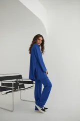 Conjunto de pantalón y blusa color beige, de punto morley.