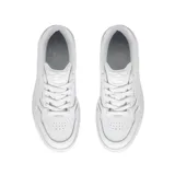 Championes Puma modelo Karmen II Idol, diseño de plataforma con capellada de cuero sintético y detalles de perforaciones. Presenta el logo de la marca en el lateral y lengüeta.