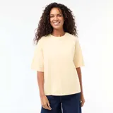 Camiseta de corte oversize y cuello redondo, con mangas cortas y diseño liso en color amarillo claro.