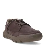 Zapatos urbanos Caterpillar modelo Hex Lite Cruise, confeccionados en cuero marrón con detalles textiles. Presentan un diseño robusto con suela de EVA ligera y goma para mayor agarre, cordones al tono y forro interior reciclado.