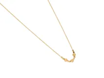 Collar dorado de acero con baño de oro, con cadena fina y dije de bolitas.