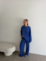 Conjunto de pantalón y blusa color beige, de punto morley.