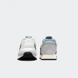 Championes urbanos Converse Omega Trainer, color blanco con detalles en gris y azul marino, confeccionados en gamuza y malla, con logo de estrella y galón en los laterales y entresuela de EVA.