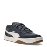 Championes urbanos Puma Park Lifestyle Sk8, color gris oscuro con detalles en blanco y suela de goma color caramelo. Presentan un diseño inspirado en el skate con paneles de cuero sintético y malla, cierre de cordones y logo Puma en el lateral.