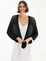 Spolverino largo de tejido calado color beige.