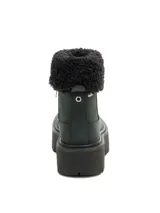 Bota de caña baja Cat modelo Colorado Max Roll Do, de color negro. Está confeccionada en nubuck con suela gruesa de goma dentada y plataforma, y cuenta con un borde superior con forro de corderito sintético negro.