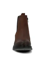 Botín tipo Chelsea de cuero color marrón, con paneles elásticos laterales negros y suela robusta de poliuretano con base gris traslúcida.