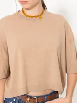 Sweater negro de lana merino y algodón, de mangas cortas y corte amplio.