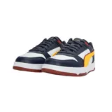 Championes Puma RBD Game Low, color azul marino con detalles en blanco, amarillo y rojo.