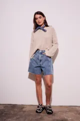 Sweater celeste de tejido de punto calado con lurex, de corte holgado y mangas largas.