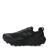 Championes de trail running New Balance Fresh Foam X Hierro v9, color negro con suela Vibram y detalles en naranja.