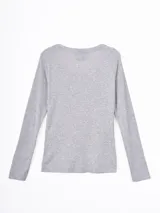 Remera de manga larga con cuello redondo, confeccionada en tejido de punto acanalado.
