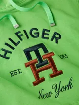 Buzo verde con capucha y cordón ajustable, confeccionado en felpa de algodón. Presenta un bolsillo tipo canguro y un monograma TH bordado en el pecho.