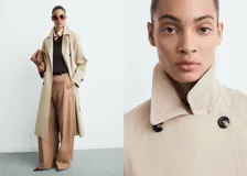 Trench coat de corte oversize y diseño largo, confeccionado en tejido de algodón y poliéster. Presenta cierre de doble botonadura, cuello de solapa ancha, mangas largas con trabillas abotonadas en los puños y dos bolsillos laterales. Incluye un cinturón desmontable a juego y forro interior completo.