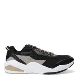 Championes deportivos Topper modelo Circus, con diseño robusto en color negro, detalles en gris y beige, y suela blanca con refuerzo en el talón. Presentan cordones jaspeados y logo de la marca en el lateral.