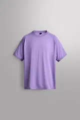 Camiseta de entrenamiento regular fit de Zara Athleticz, color lila, confeccionada en tejido técnico fluido y ligero con cuello redondo y manga corta ranglán.