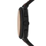 Set de reloj Fossil modelo Machine con caja negra, esfera marrón y correa de cuero marrón. Incluye una pulsera trenzada de cuero marrón y negro.