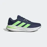 Championes de running Adidas Galaxy 7, color azul marino con las icónicas tres tiras en verde lima y suela blanca con tecnología Cloudfoam.