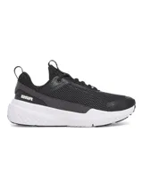Championes de entrenamiento Under Armour Project Rock BSR 5, color negro con suela blanca. Presentan una parte superior de malla transpirable con revestimientos de gamuza, mediasuela Charged Cushioning para amortiguación reactiva y tecnología UA TriBase para mayor estabilidad y contacto con el suelo.