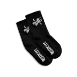 Medias de algodón negras de media caña con logo de la marca bordado en blanco.