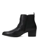 Botas de caña baja marca Bottero, confeccionadas en cuero color beige, con detalle de dos tiras con hebillas metálicas oscuras y taco cuadrado negro.