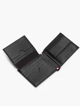 Billetera plegable de cuero Tommy Hilfiger en color negro, con acabado granulado y logo esmaltado de la marca en la esquina inferior.