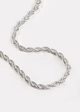 Cadena plateada de acero quirúrgico hipoalergénico con eslabones tipo tourbillón.