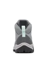 Bota de montaña Columbia, modelo Transverse Hike Waterproof, color gris acero con detalles en rosado pálido. Caña media, confeccionada en cuero y malla, con tecnología Omni-Tech impermeable y suela Omni-Grip para tracción.