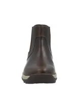 Botín tipo Chelsea de cuero color marrón oscuro, con paneles laterales elásticos y suela de plataforma color beige con tecnología honeyfoam.