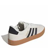 Championes Adidas VL Court 3.0 para mujer, de color beige con las tres tiras características en negro y suela de goma marrón.