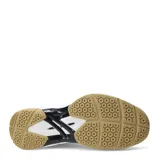 Championes de fútbol sala Umbro modelo Grip Pad, color negro con detalles en dorado y blanco. Presentan una suela de goma color caramelo diseñada para superficies de interior, con refuerzos en la puntera y laterales para mayor durabilidad.