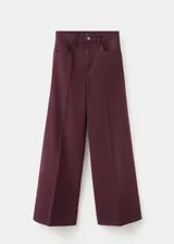 Jeans Elise de corte wide leg y tiro medio, en color bordó, confeccionados en denim con diseño de perneras amplias.
