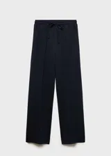 Pantalón de jogging azul marino de tejido fluido con cintura elástica ajustable con lazo, tiro medio, dos bolsillos laterales y costuras decorativas.