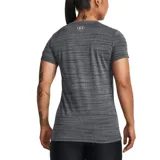 Remera Under Armour Tech para mujer, color coral con textura jaspeada y logo en el pecho.