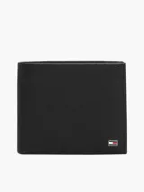 Billetera plegable de cuero Tommy Hilfiger en color negro, con acabado granulado y logo esmaltado de la marca en la esquina inferior.