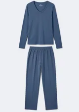Pijama de algodón color azul, compuesto por una remera de manga larga con escote en V y un pantalón largo de corte recto y holgado.