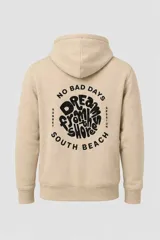 Campera con capucha y cierre frontal de cremallera, color beige, con bolsillos tipo canguro y estampa gráfica en el pecho con diseño de palmeras y texto "Southbeach".