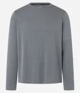 Remera deportiva de manga larga con cuello redondo, confeccionada en tejido técnico con tecnología Dry para mayor transpirabilidad y protección UV.