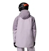 Campera anorak Columbia Coreshot para mujer, de diseño impermeable y transpirable con tecnología Omni-Tech. Es de color lila con bloques en tonos más oscuros y detalles en color naranja en las cremalleras. Cuenta con capucha compatible con casco, media cremallera frontal, bolsillo canguro delantero, bolsillo en el pecho y aberturas de ventilación bajo las axilas.