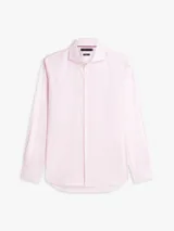 Camisa de manga larga Tommy Hilfiger con cuello clásico y cierre frontal de botones, con patrón de rayas finas en color rosado y blanco.
